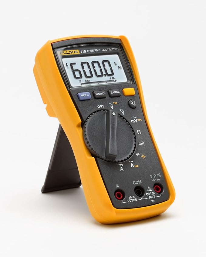 Fluke Multímetro digital 115, mede tensão AC/DC até 600 V e corrente AC/DC até 10 A, mede resistência, continuidade, frequência e capacitância, inclui coldre e conjunto de teste de silicone