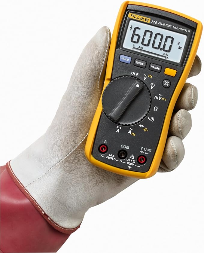 Fluke Multímetro digital 115, mede tensão AC/DC até 600 V e corrente AC/DC até 10 A, mede resistência, continuidade, frequência e capacitância, inclui coldre e conjunto de teste de silicone